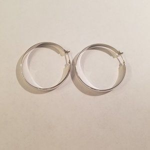 Silver tone hoop earrings